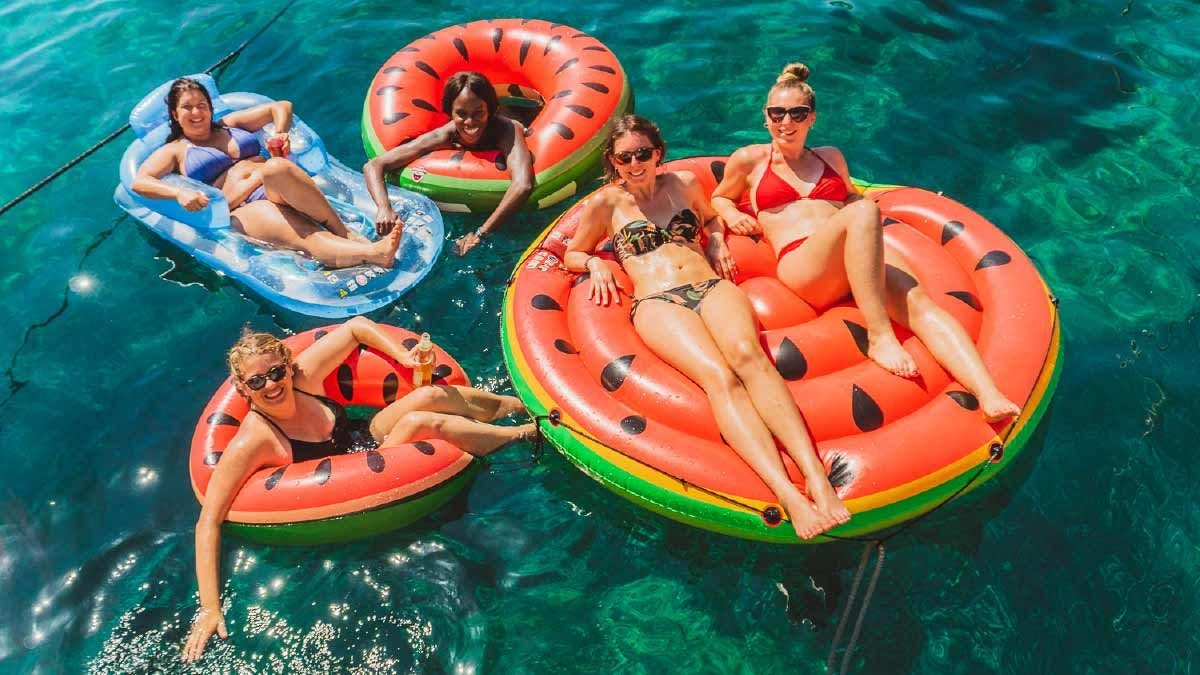 Group of women relaxing on inflatables in Croatia