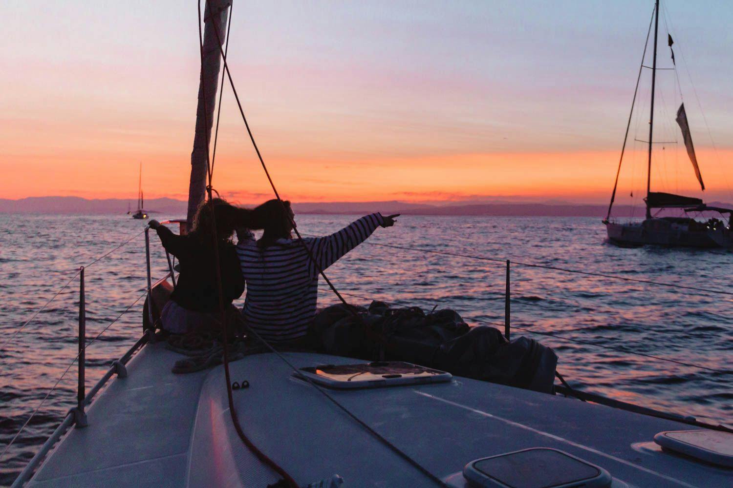 Photo of a sunrise over Vis Croatia on a sailboat. Photo by Ryan Brown of Lost Boy Memoirs.
