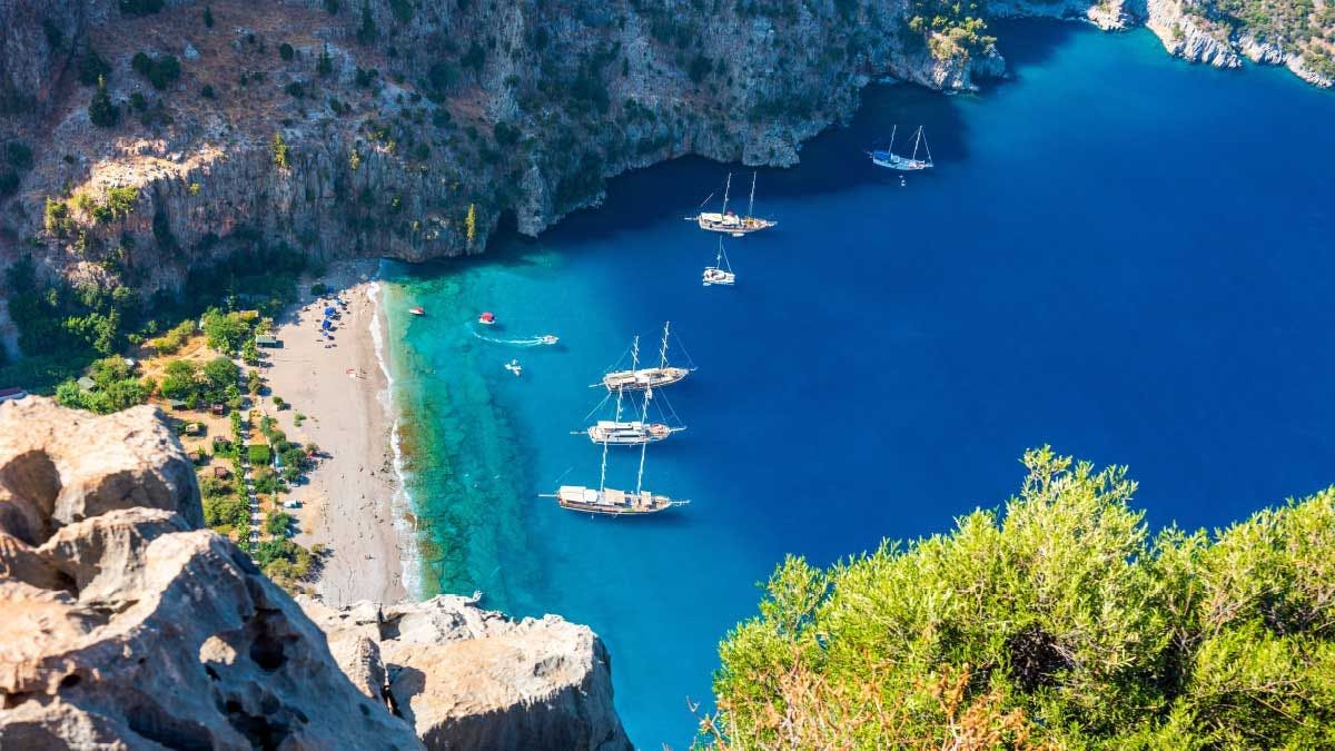 Yachts anchored in a bay in Butterfly Valley in Turkey