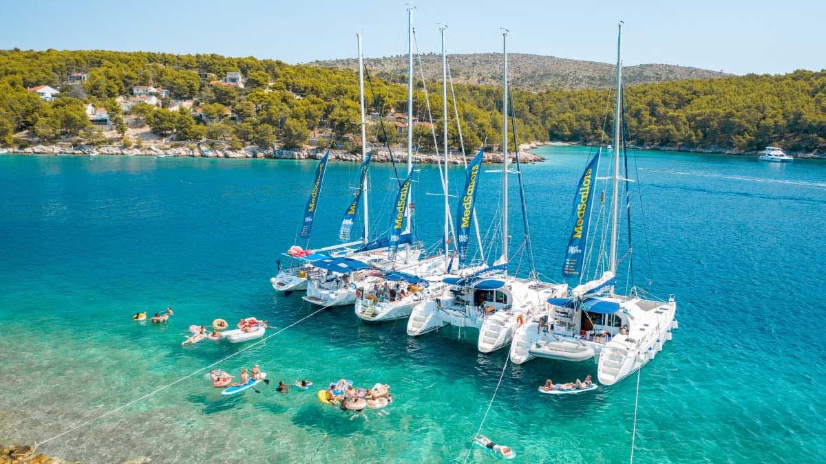 MedSailors flotilla rafted together in a bay in Greece