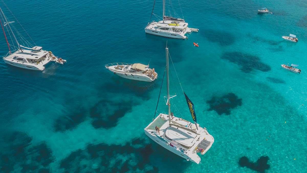 Yachts anchored in a bay in St Stefanos