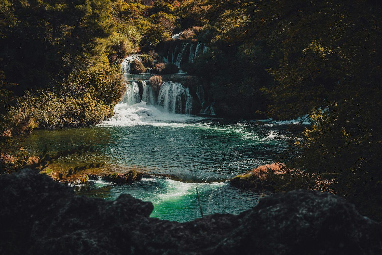 Visiting Krka National Park in Croatia. Photo of Krka Waterfalls by Ryan Brown of Lost Boy Memoirs