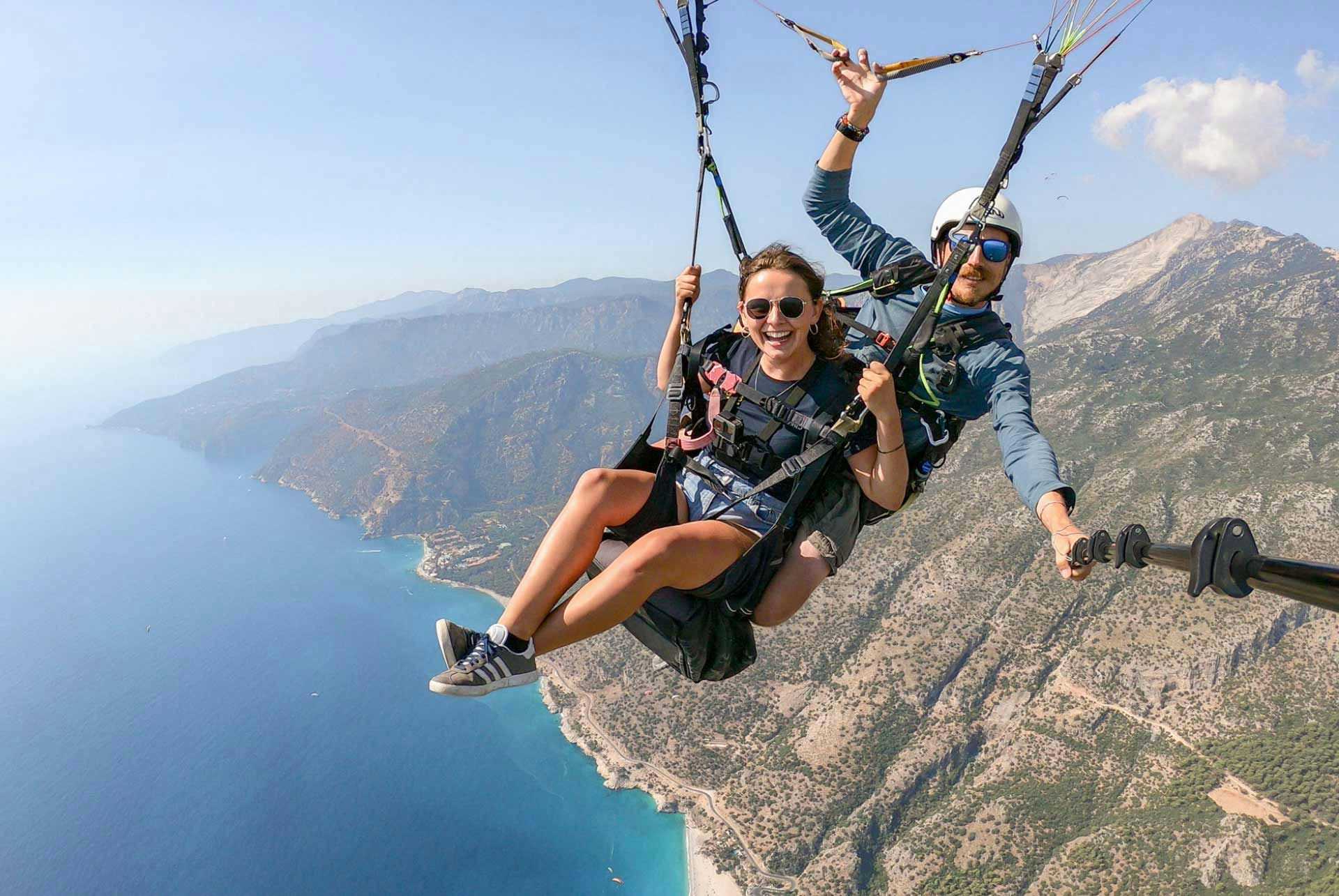 Woman paragliding over Oludeniz