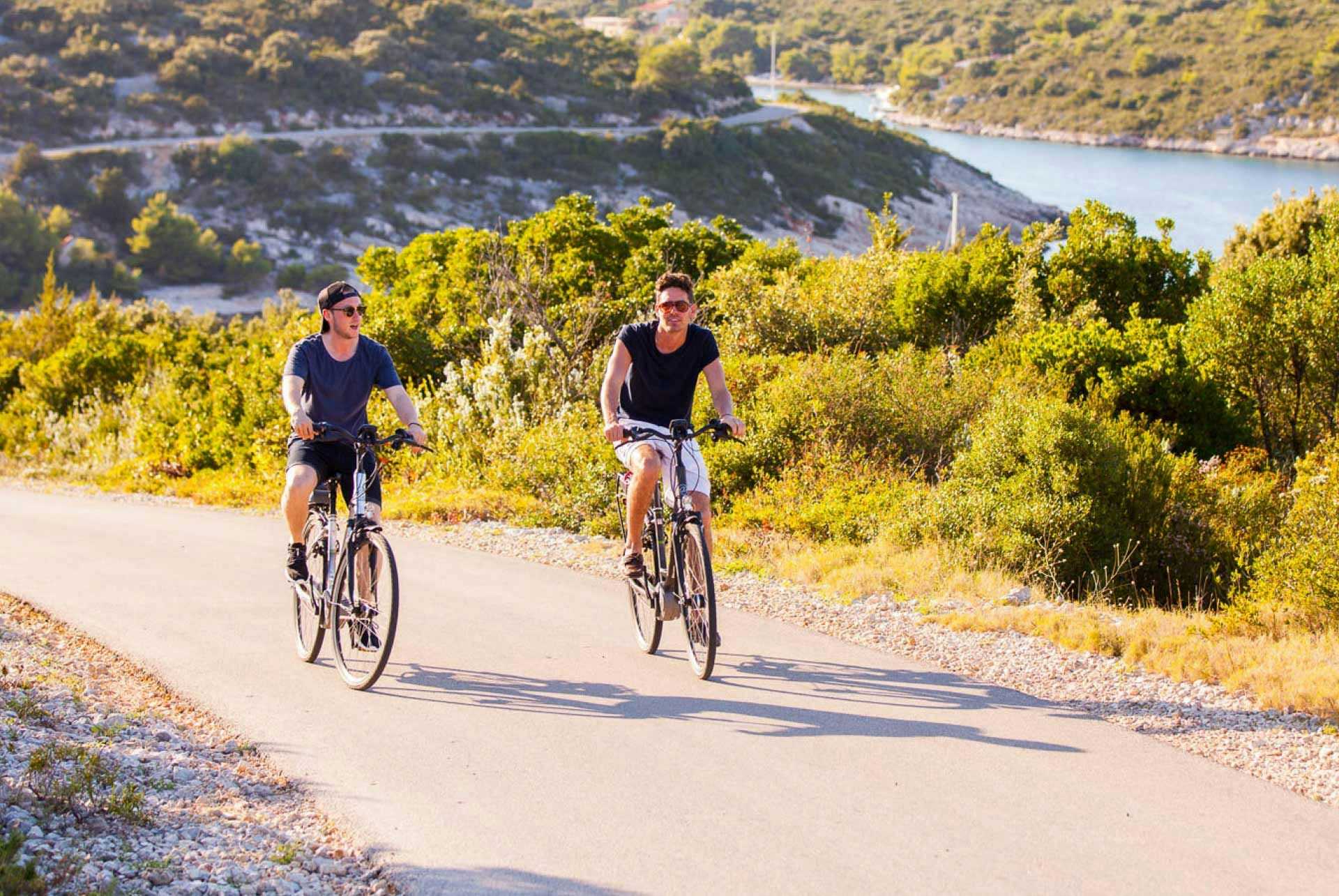 Two men cycling on Vis Island in Croatia