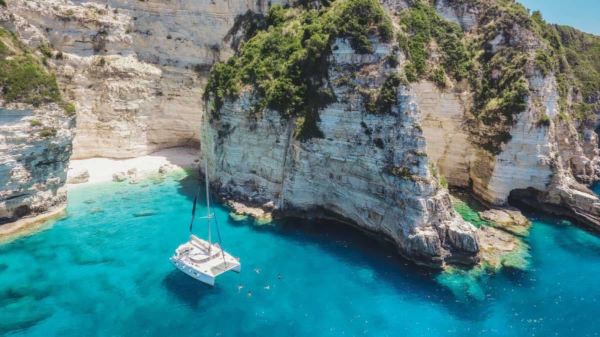 MedSailors catamaran anchored at the blue caves in Antipaxos