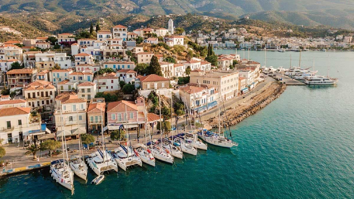 MedSailors yachts lined up on the town quay in Poros